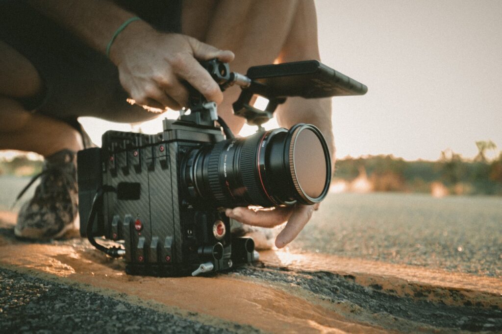 Camera operator shoots footage at wai kai venue